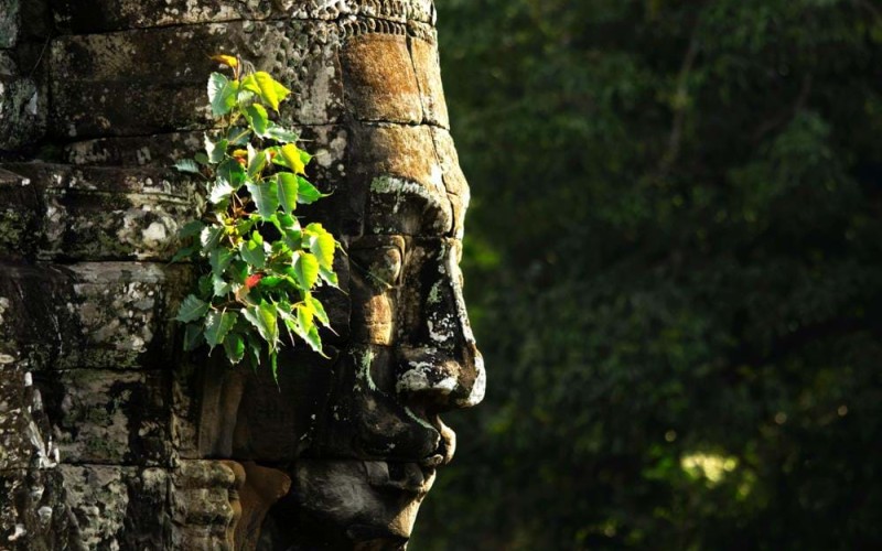 Angkor Wat faced carved of stone at Angkor Complex