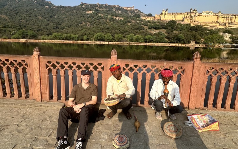 Sitting with snake charmers outside Amber Fort, Jaipur