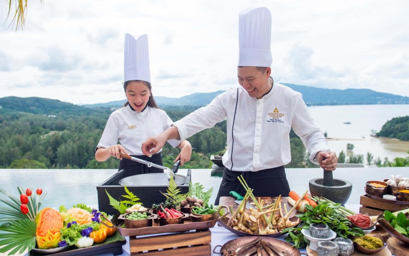 Chefs cooking Thai food in Phuket