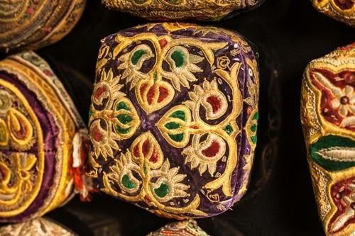 Golden Threads: Suzani, Caps and Carpets